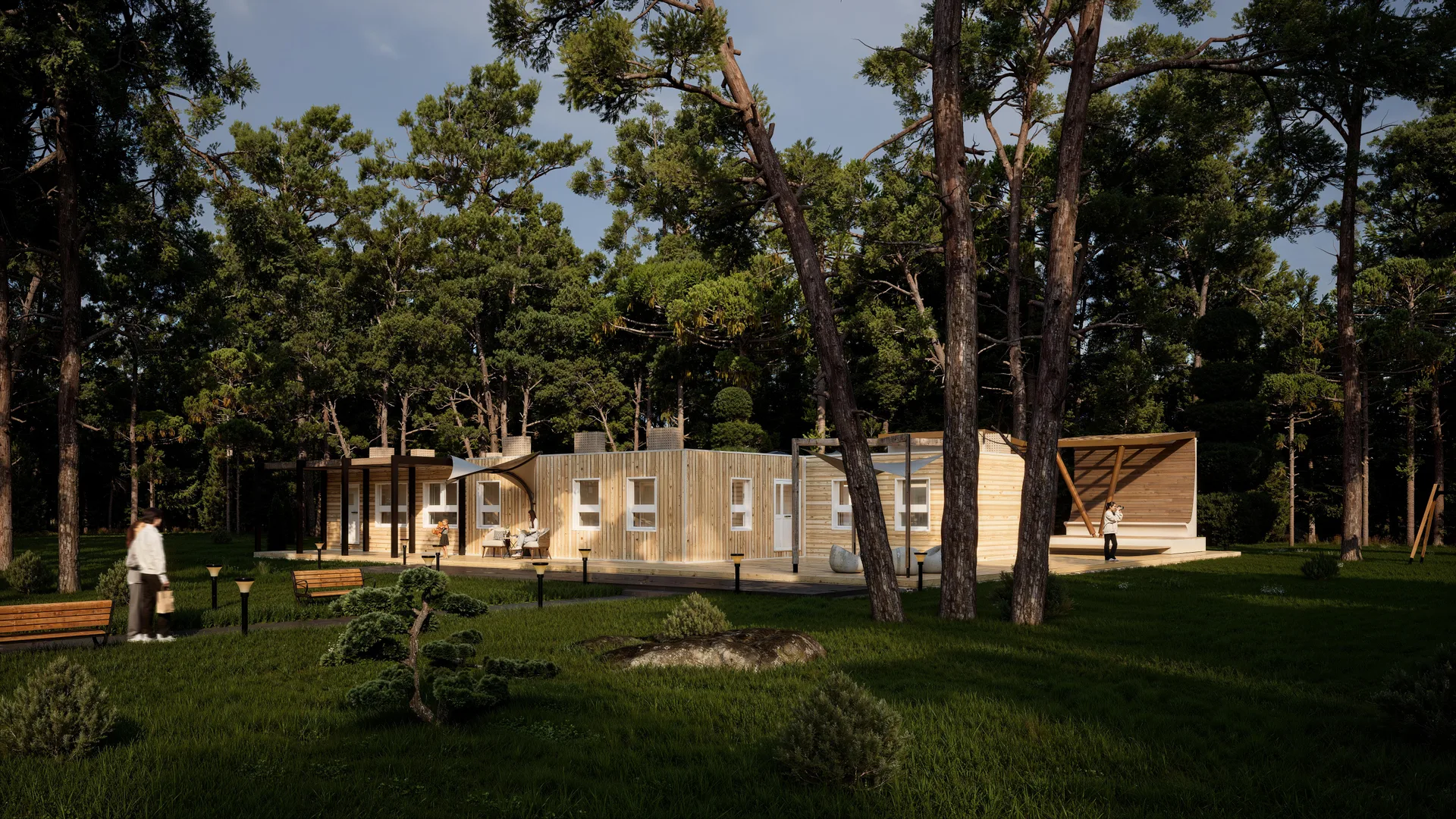 Villa Resort Forestale: vista esterna della facciata in doghe di larice, con le pergole, le vele ombreggianti e la terrazza